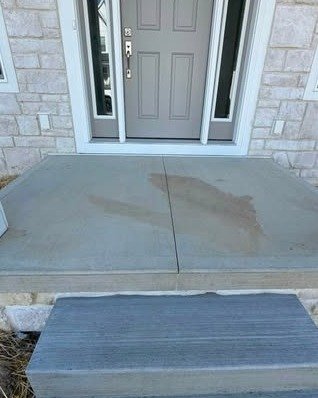 Custom covered concrete porch built for a Apex, North Carolina homeowner in Apex, NC