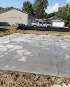 Large concrete slab poured on a graded lot in Apex, NC