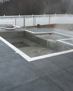 Concrete pool deck forms and clean saw cut lines in Apex, NC