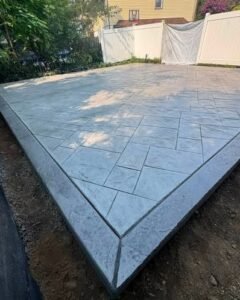 Stamped concrete patio with a bordered edge in Apex, NC