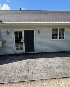 Stamped concrete patio at the back of a home in Apex, NC